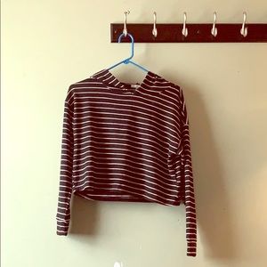 Black and white striped cropped hoodie.